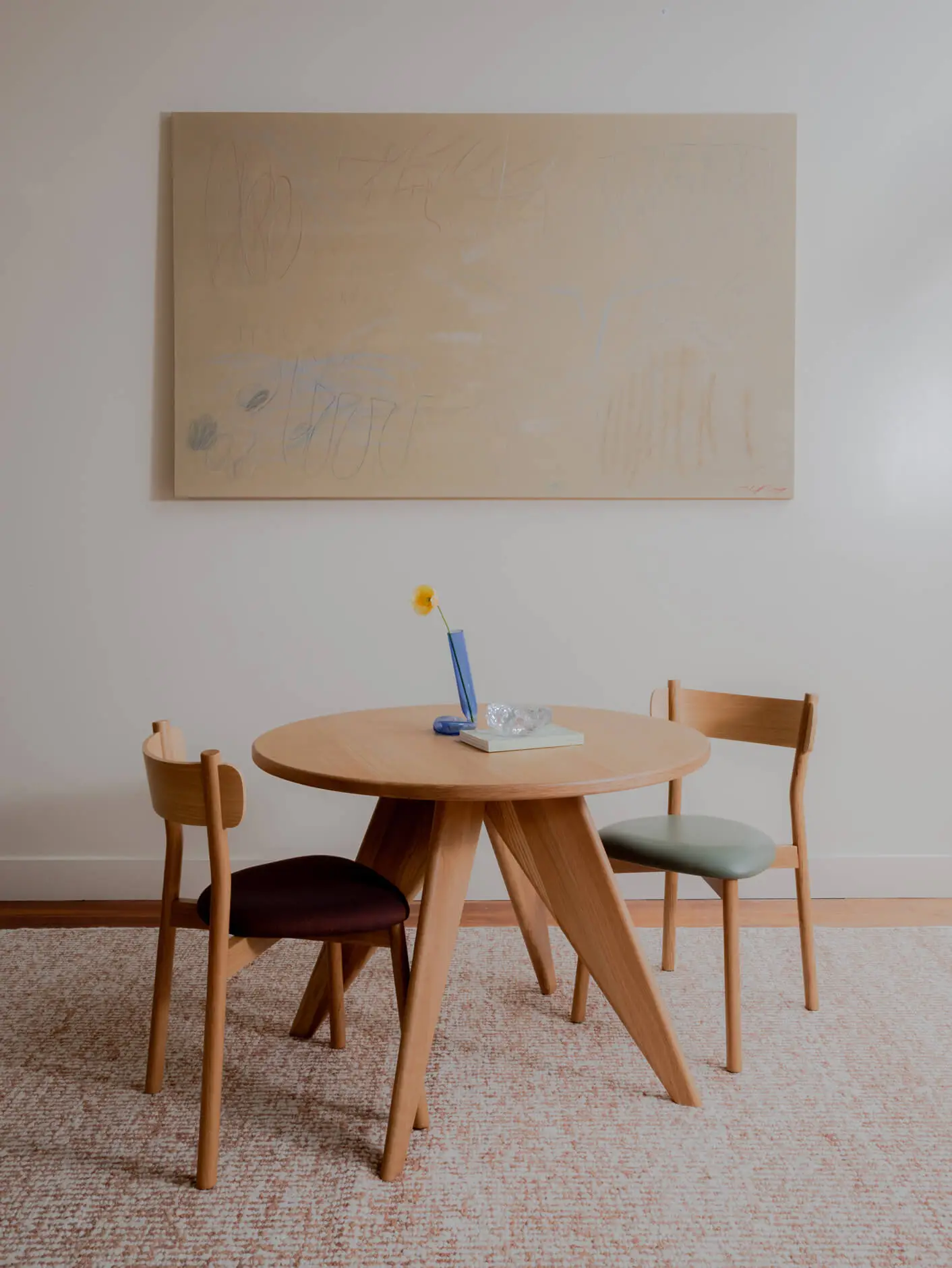 Round dining set with two American Oak Charlie dining chairs with upholstered seat bases in fabric and leather