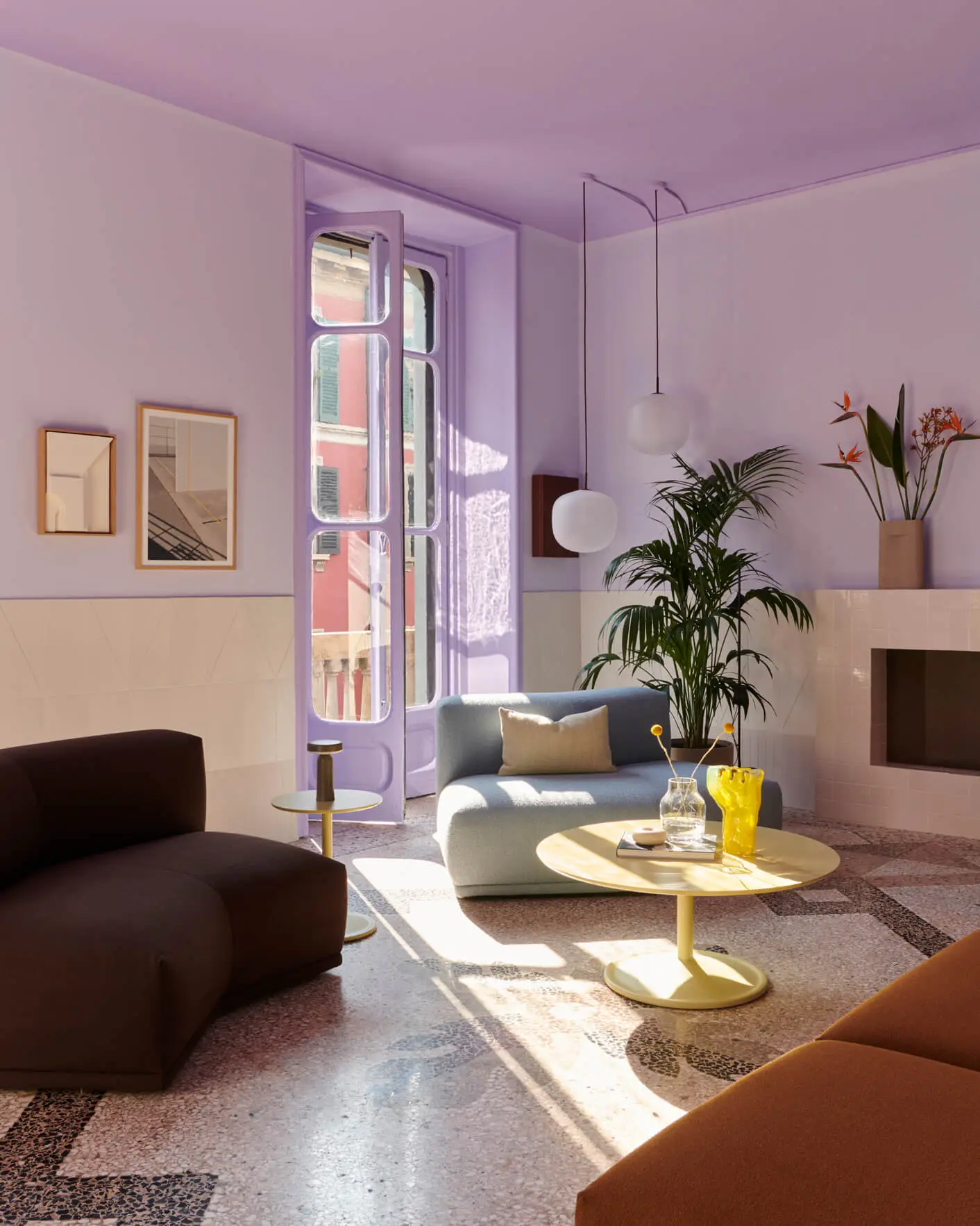 Apartment in Milan, Italy, with bright colorful walls and bright colorful furniture and interior styling